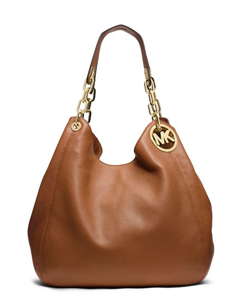 michael kors hand bags fulton large charm shoulder tote brown|Michael Kors fulton crossbody.